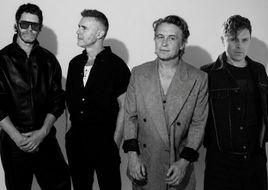 Auf ihrer neuen Single "Feel My Love" haben Take That einen ganz besonderen Gast: Michael Patrick Kelly